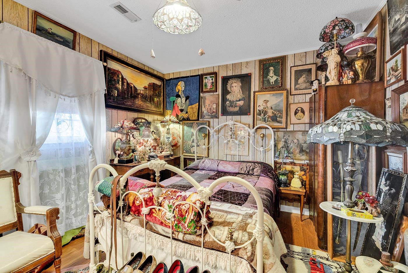 2023 Asbury Street Georgetown, SC 29440 - Photo 18 of 40 Bedroom with wood finished floors and wooden walls