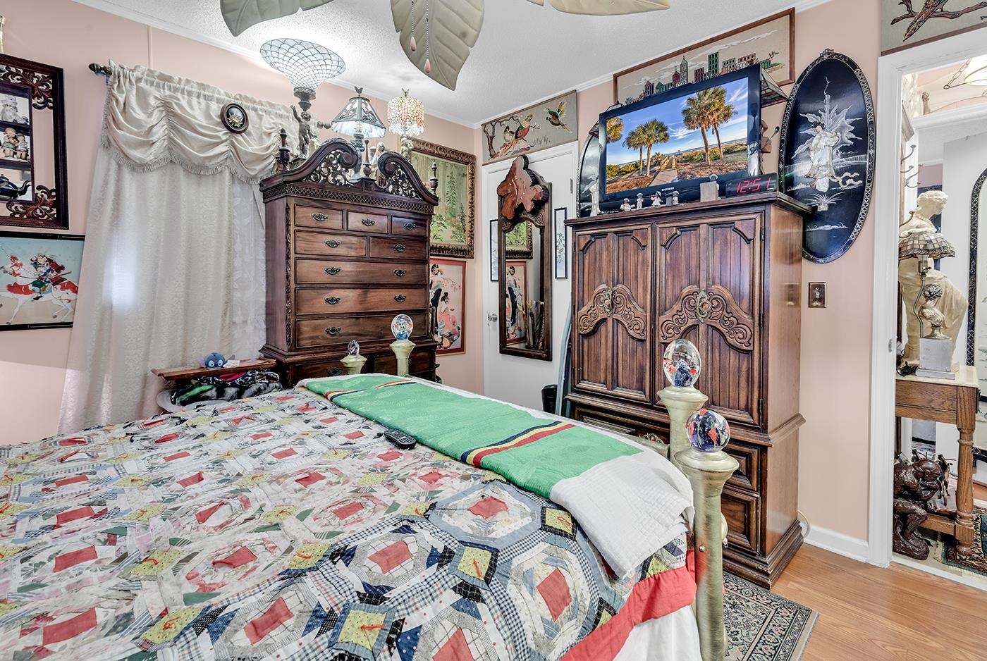 2023 Asbury Street Georgetown, SC 29440 - Photo 21 of 40 Bedroom featuring light wood-style floors and baseboards