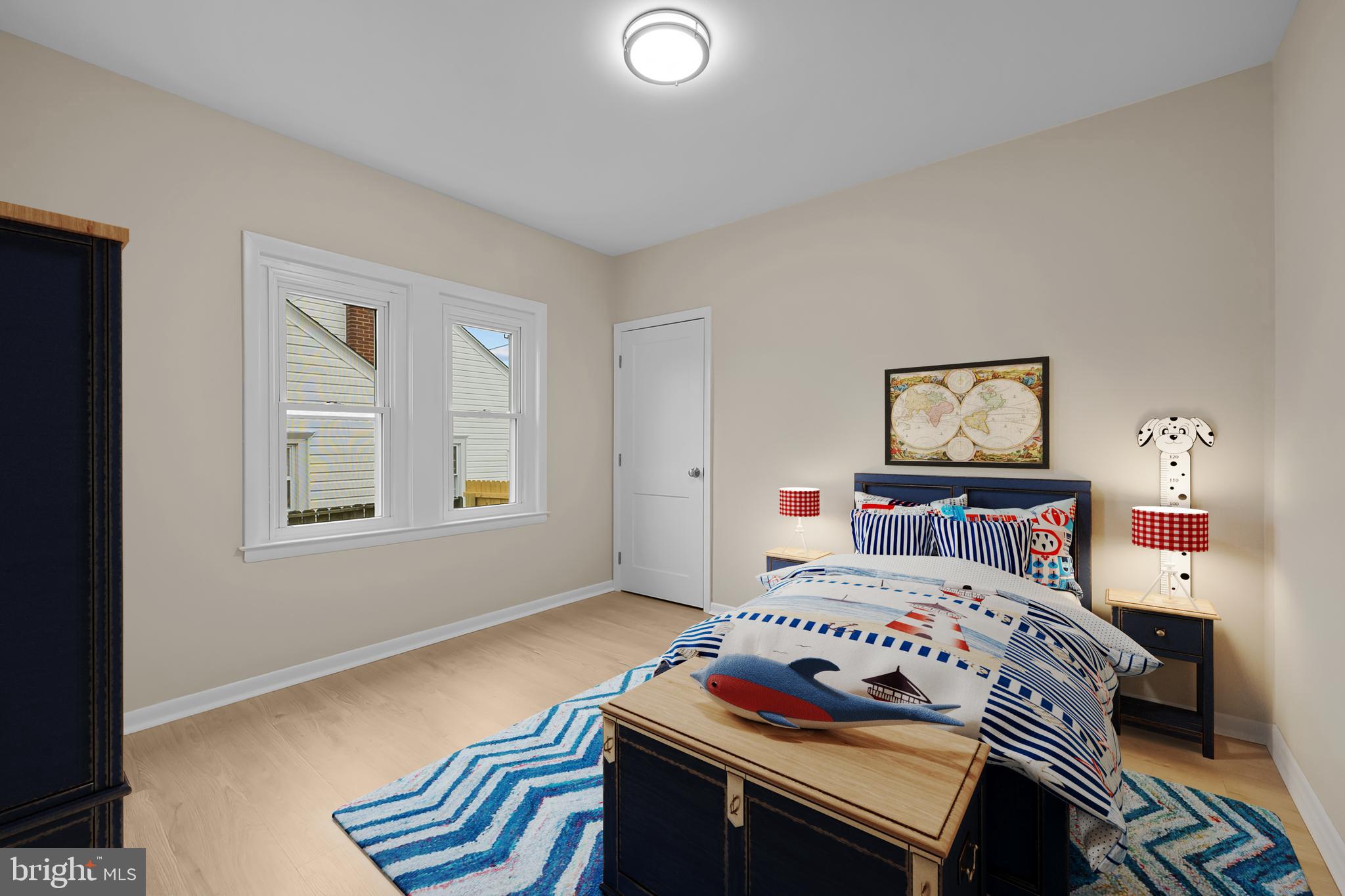 327 West Summit Avenue Wilmington, DE 19804 - Photo 17 of 26 a bedroom with a bed and wooden floor