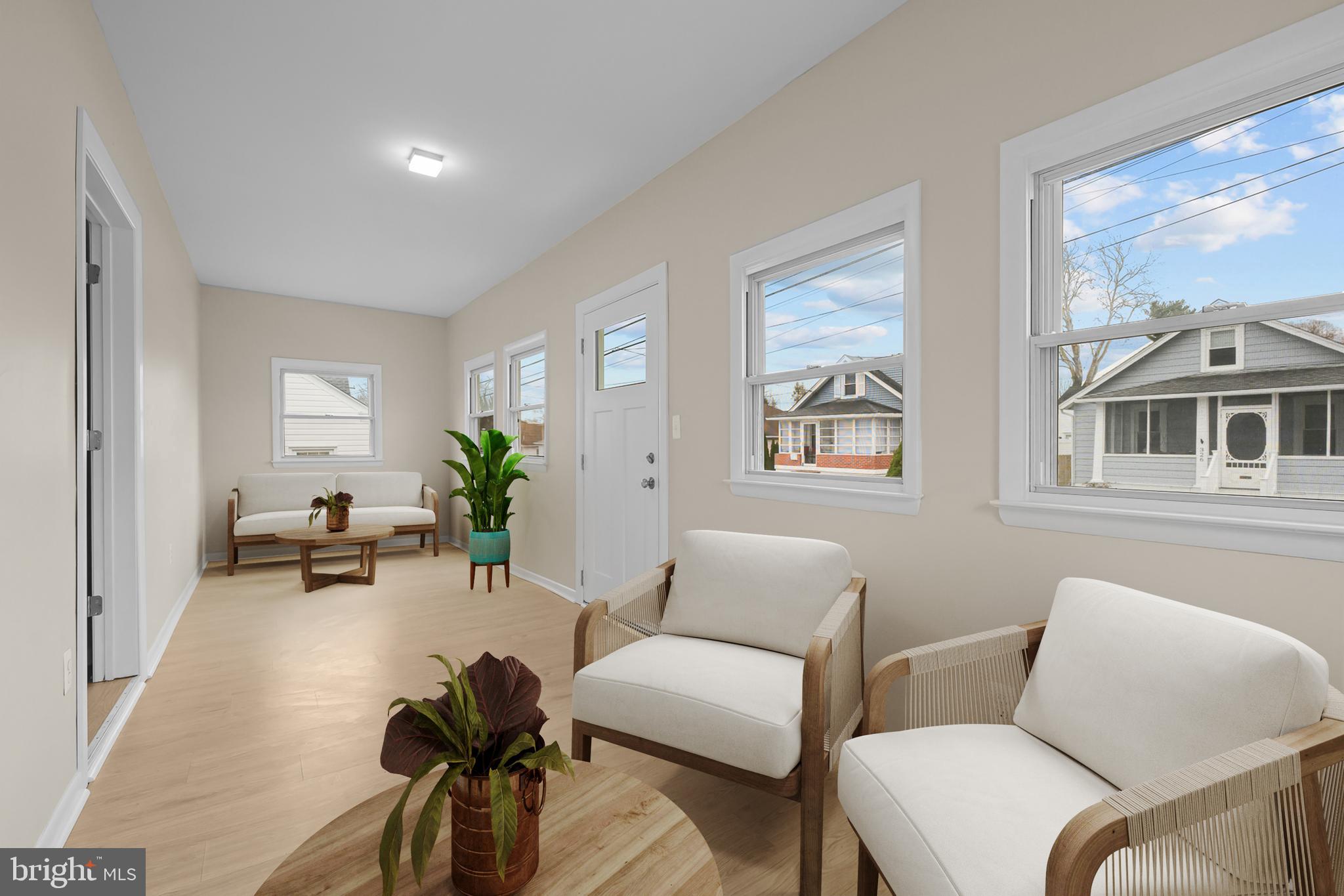 327 West Summit Avenue Wilmington, DE 19804 - Photo 2 of 26 a living room with furniture and wooden floor
