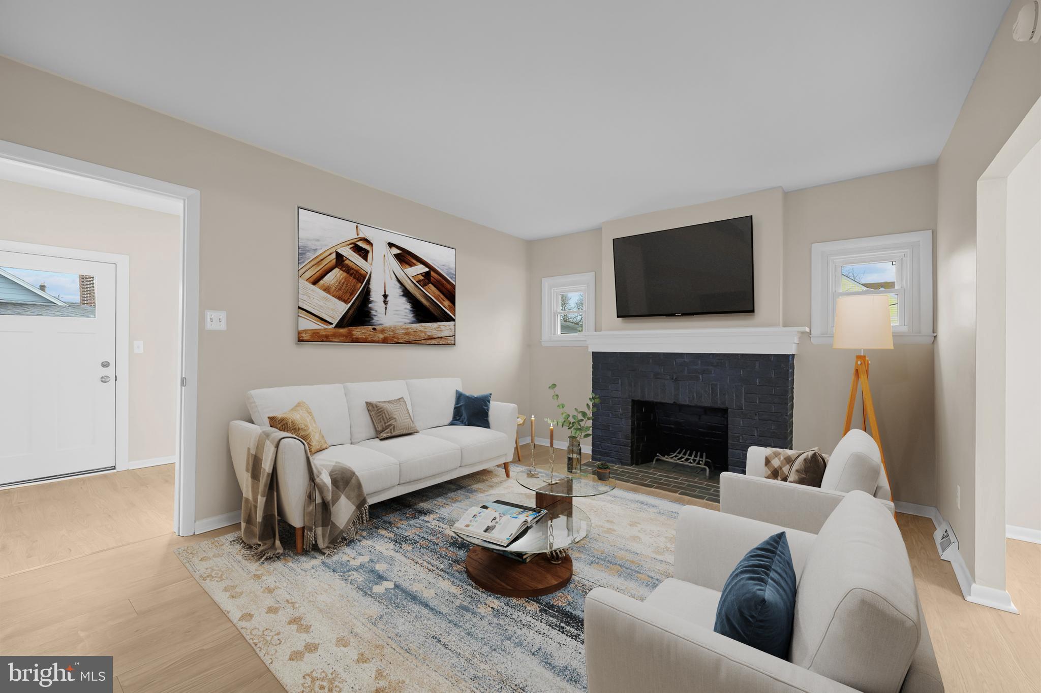 327 West Summit Avenue Wilmington, DE 19804 - Photo 4 of 26 a living room with furniture and a fireplace