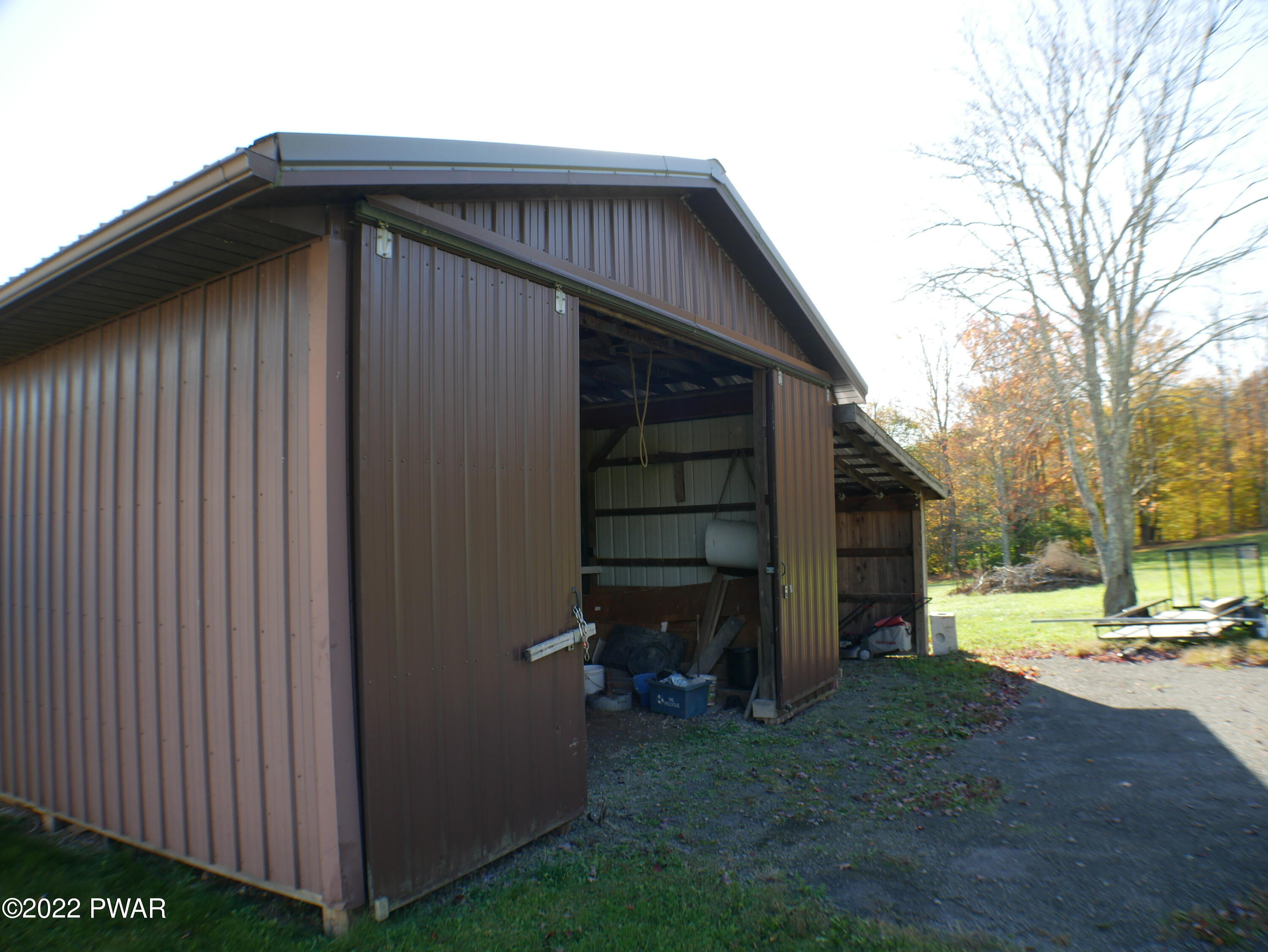 1259 Dougherty Road Meshoppen, PA 18630 - Photo 2 of 61 a view of backyard of house and wooden deck