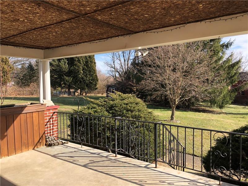 2650 Ridge Rd Extension Baden, PA 15005 - Photo 20 of 25 Covered side porch offers plenty of room for outdoor relaxation