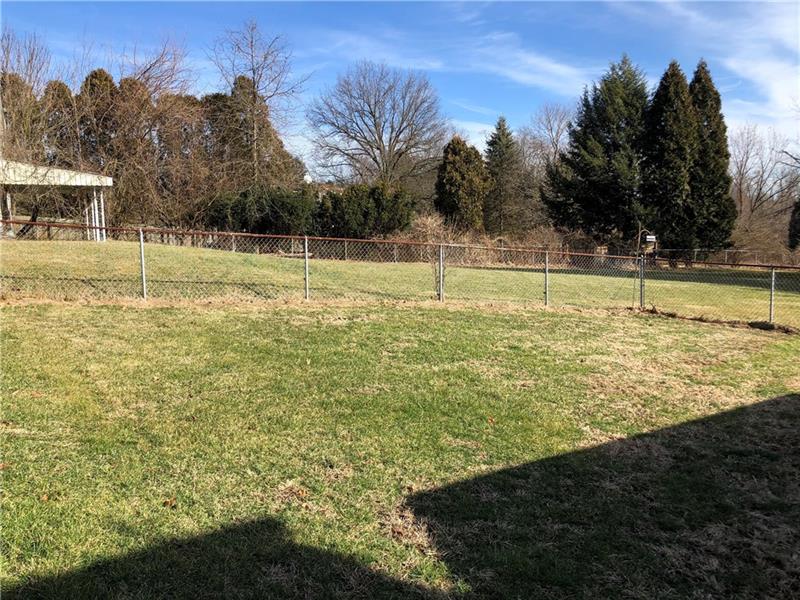 2650 Ridge Rd Extension Baden, PA 15005 - Photo 24 of 25 Partially fenced yard off of the patio is perfect for kids and pets.