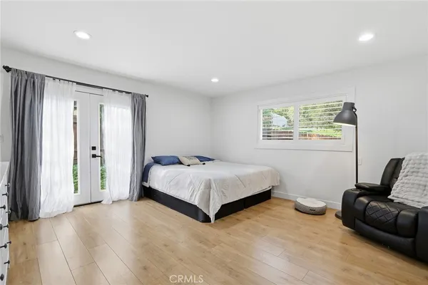 a room with a bed and a window