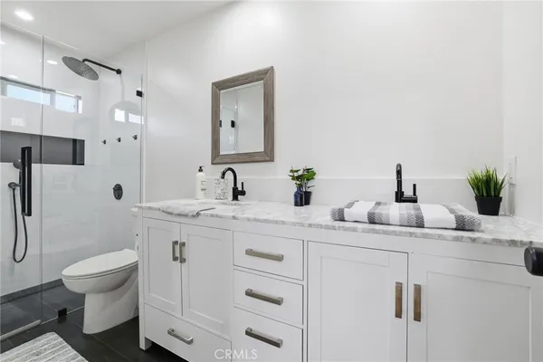 a room with furniture and gym equipment