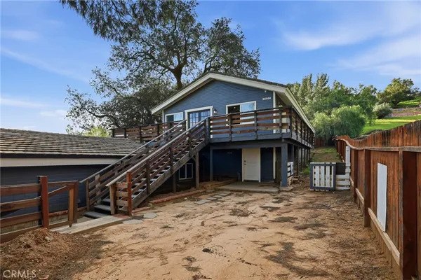 a view of a house with a roof deck