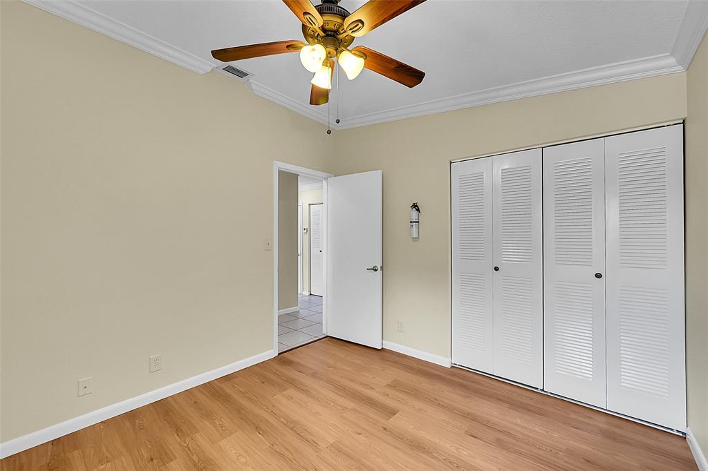 22306 Timberly Drive, Unit 22306 Boca Raton, FL 33428 - Photo 15 of 26 a view of an empty room with a window