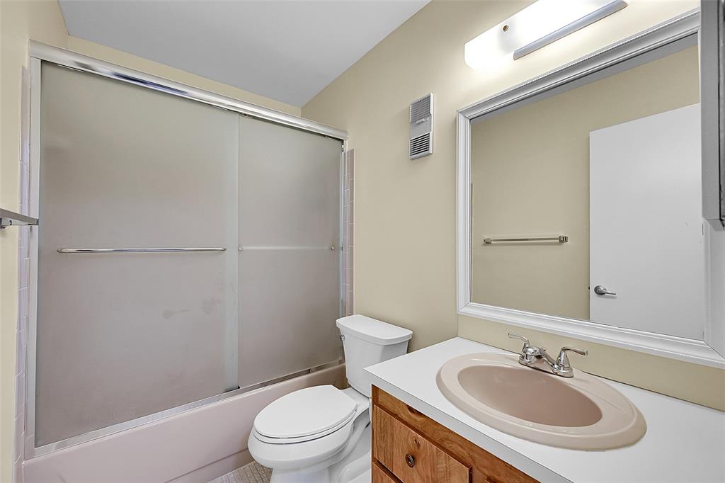 22306 Timberly Drive, Unit 22306 Boca Raton, FL 33428 - Photo 17 of 26 a bathroom with a sink toilet and shower