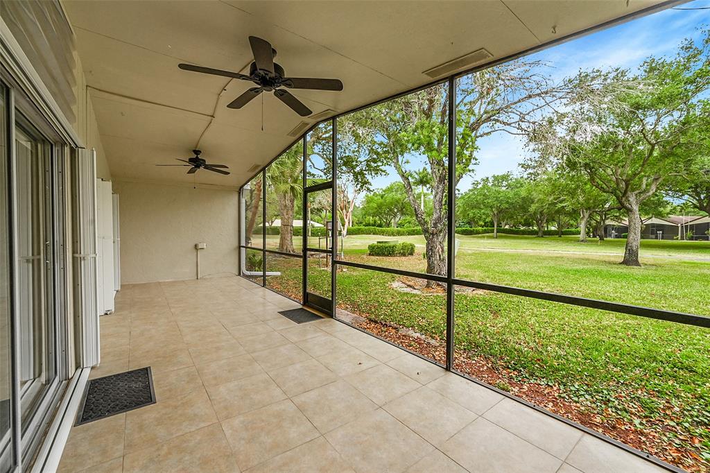 22306 Timberly Drive, Unit 22306 Boca Raton, FL 33428 - Photo 21 of 26 a view of outdoor space with seating area