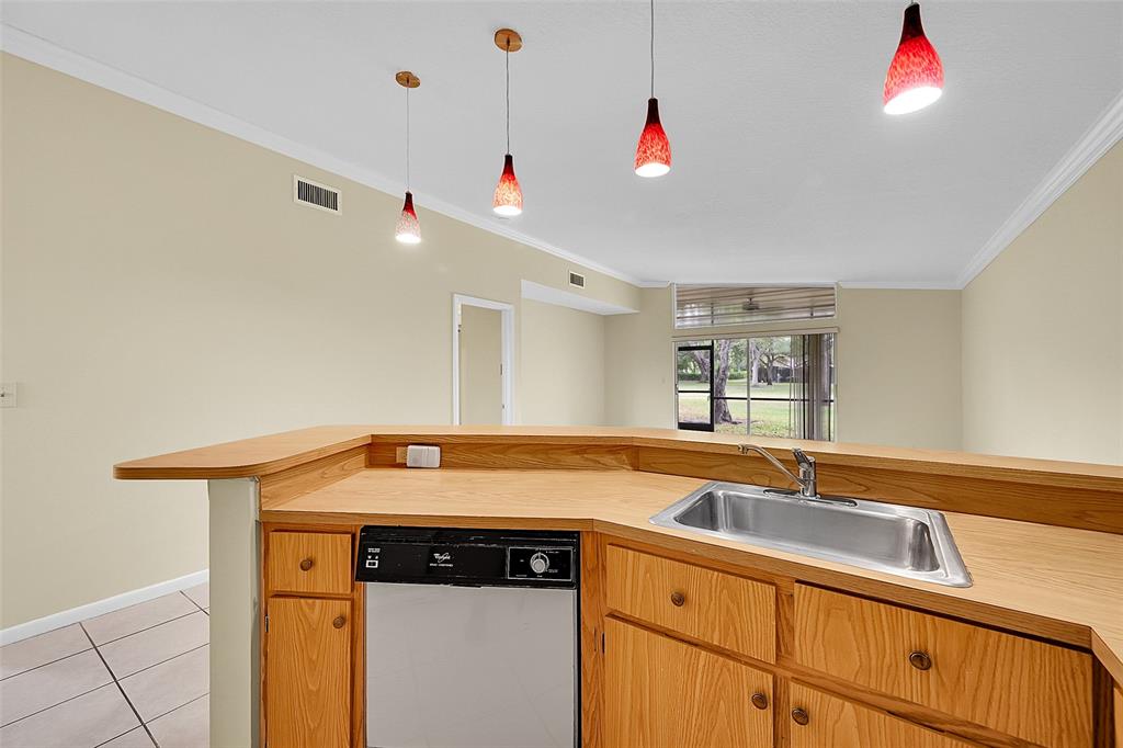 22306 Timberly Drive, Unit 22306 Boca Raton, FL 33428 - Photo 3 of 26 a utility room with dryer and washer