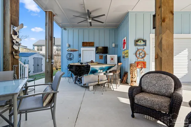 a view of a balcony with furniture
