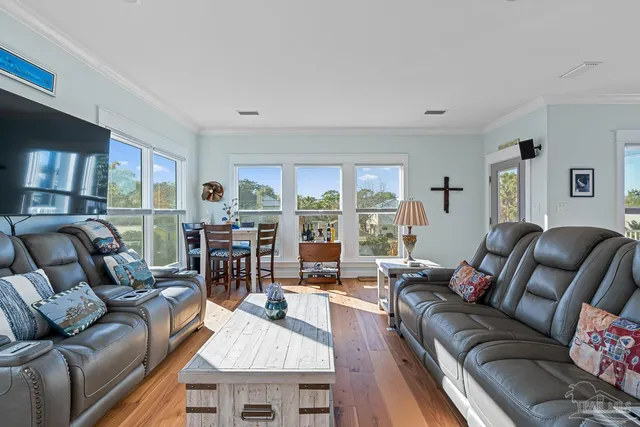 a view of a living room and a large window
