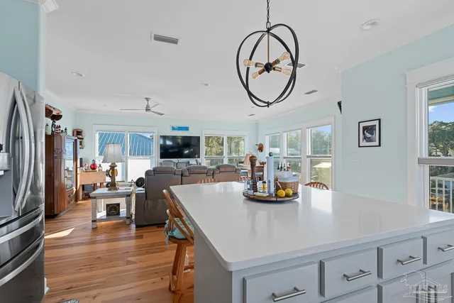 a bathroom with double vanity sink and a mirror