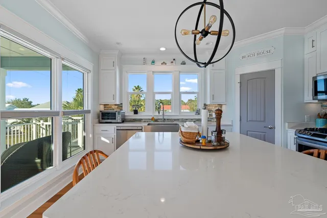 a workspace with furniture window and wooden floor