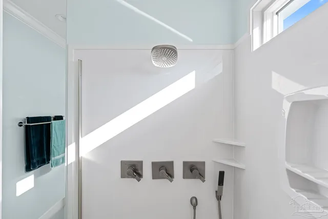 a view of a swimming pool with seating area