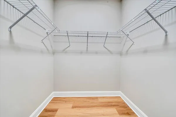 a view of a room with racks on the wall