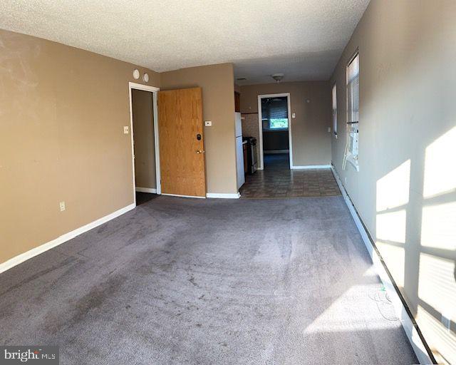 203 Robbins Street Philadelphia, PA 19111 - Photo 19 of 31 a view of an empty room with window