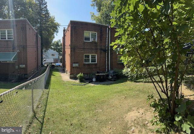 203 Robbins Street Philadelphia, PA 19111 - Photo 5 of 31 a view of a house with a yard