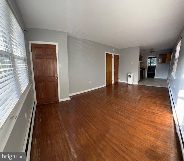 203 Robbins Street Philadelphia, PA 19111 - Photo 9 of 31 wooden floor in an empty room with a window