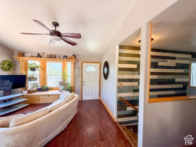 425 East Mule Deer Road Central, UT 84722 - Photo 6 of 72 Foyer entrance featuring a ceiling fan, wood finished floors, a textured ceiling, and baseboards