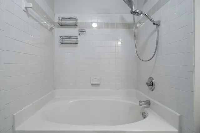 a close view of a bathtub in bathroom