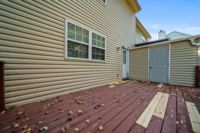 a view of a backyard with a door