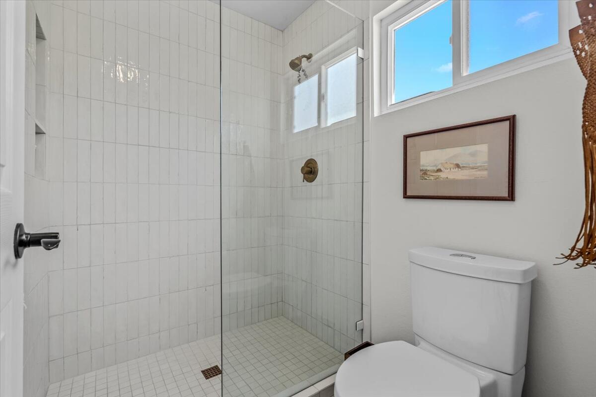 73149 Haystack Road Palm Desert, CA 92260 - Photo 16 of 32 a bathroom with a toilet and a shower