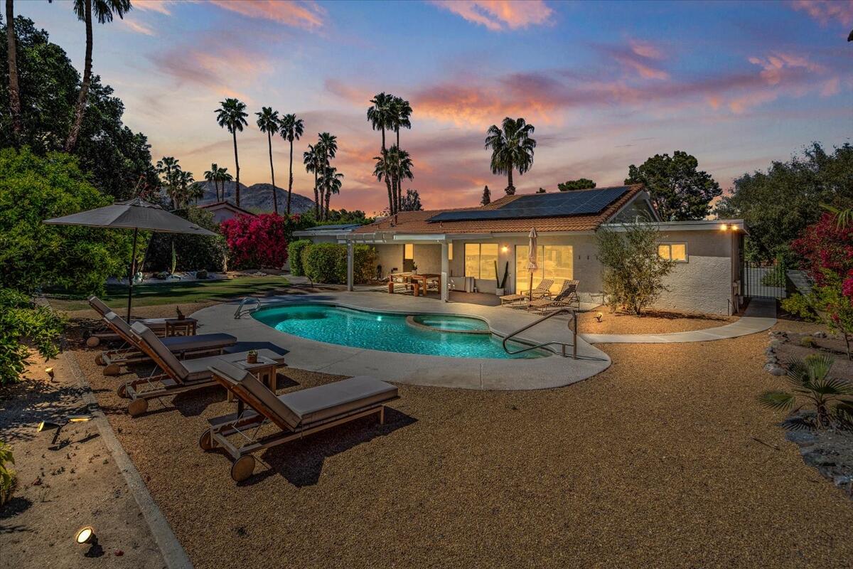 73149 Haystack Road Palm Desert, CA 92260 - Photo 2 of 32 a view of a backyard with a patio