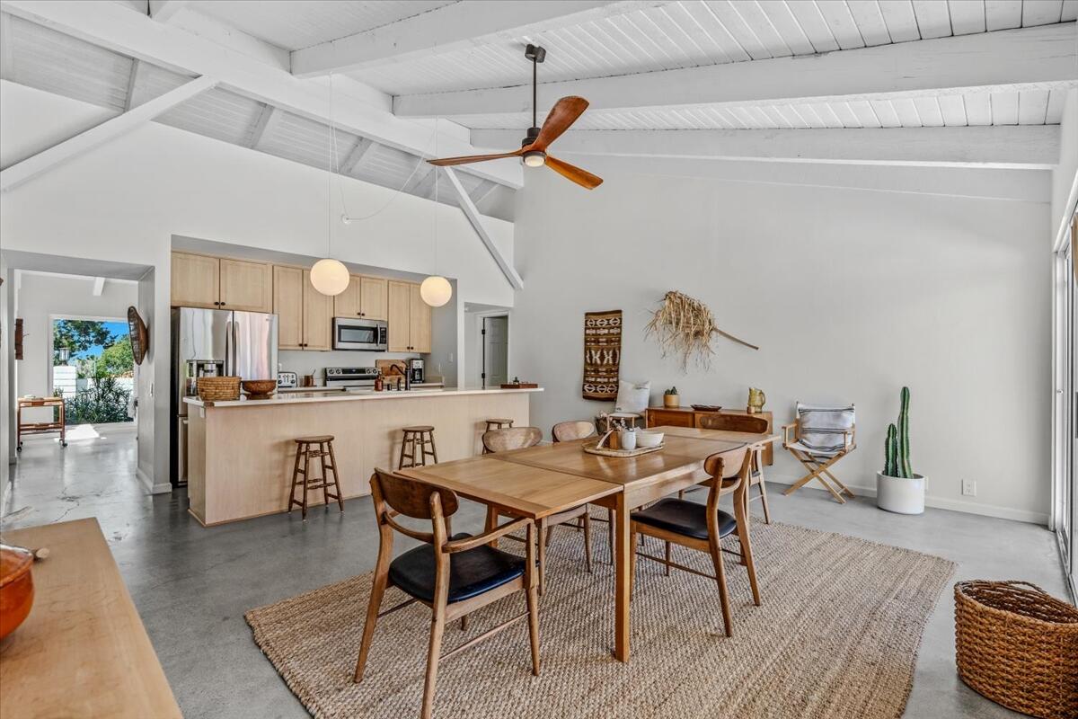73149 Haystack Road Palm Desert, CA 92260 - Photo 21 of 32 a dining room with furniture and wooden floor