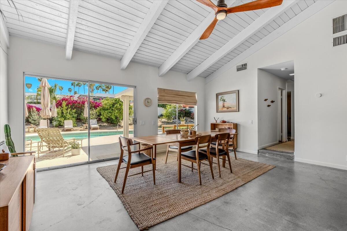 73149 Haystack Road Palm Desert, CA 92260 - Photo 22 of 32 a dining room with furniture outdoor view and a potted plant