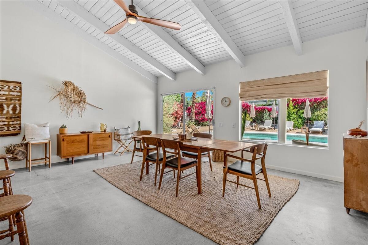 73149 Haystack Road Palm Desert, CA 92260 - Photo 29 of 32 a view of a dining room with furniture
