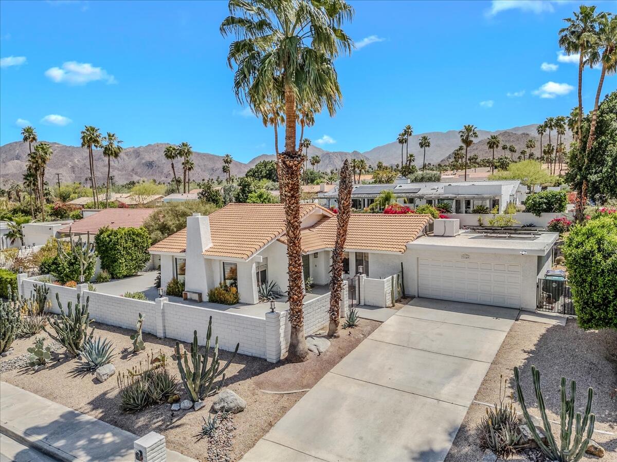 73149 Haystack Road Palm Desert, CA 92260 - Photo 8 of 32 a view of a terrace with chairs and potted plants
