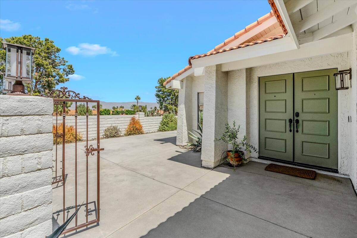 73149 Haystack Road Palm Desert, CA 92260 - Photo 9 of 32 a view of a house with backyard