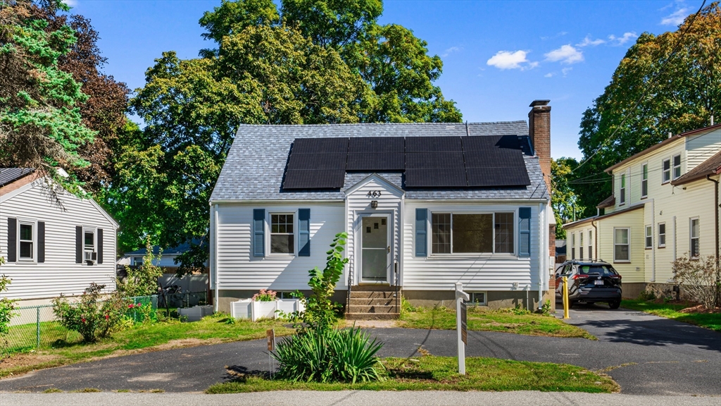 463 Lincoln Street Waltham, MA 02451 - Photo 1 of 23 a front view of a house with a yard
