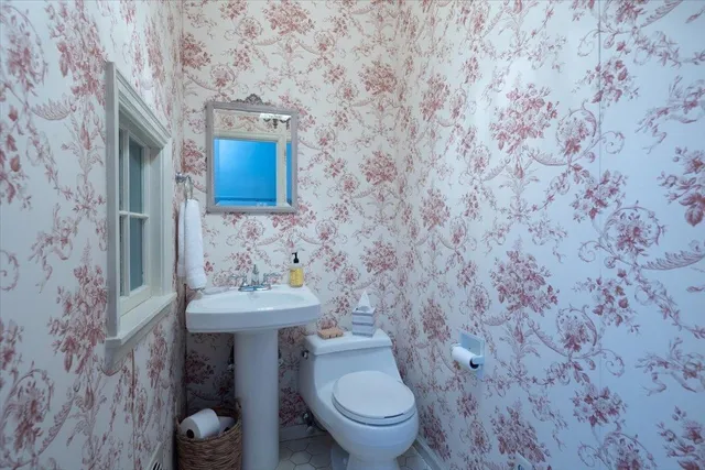 a bathroom with a sink and a toilet