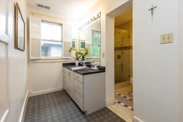 a kitchen with sink and window