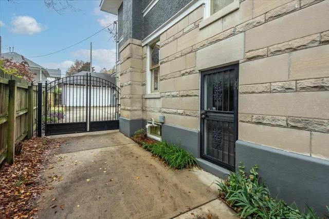 a view of a pathway of a building with a yard