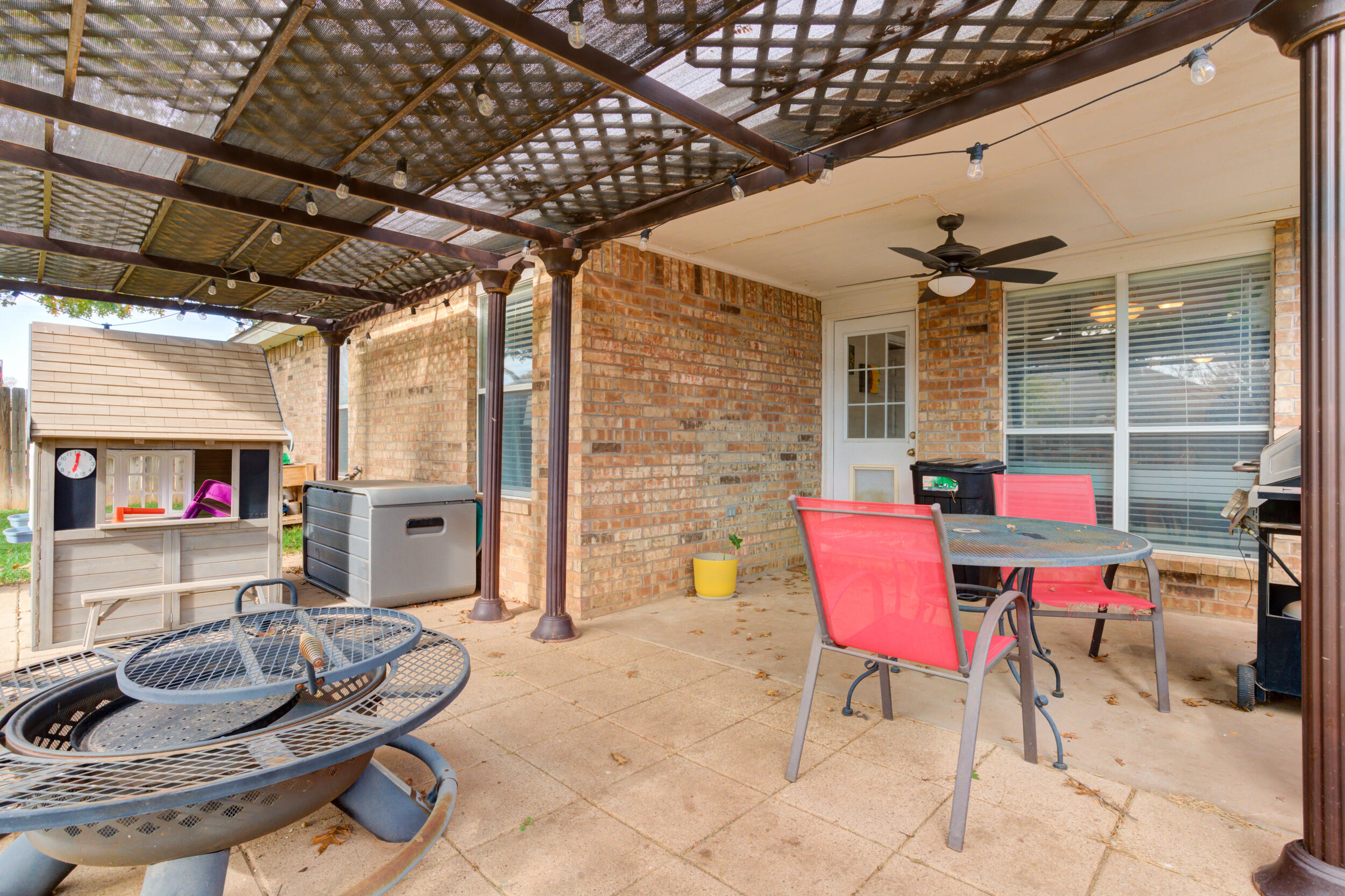 1607 79th Street Lubbock, TX 79423 - Photo 51 of 53 a dining room with furniture and a wooden floor