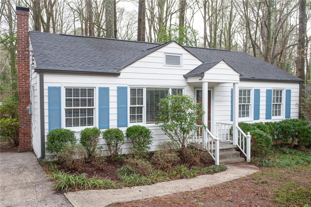 858 Scott Circle Decatur, GA 30033 - Photo 1 of 1 a front view of a house with garden