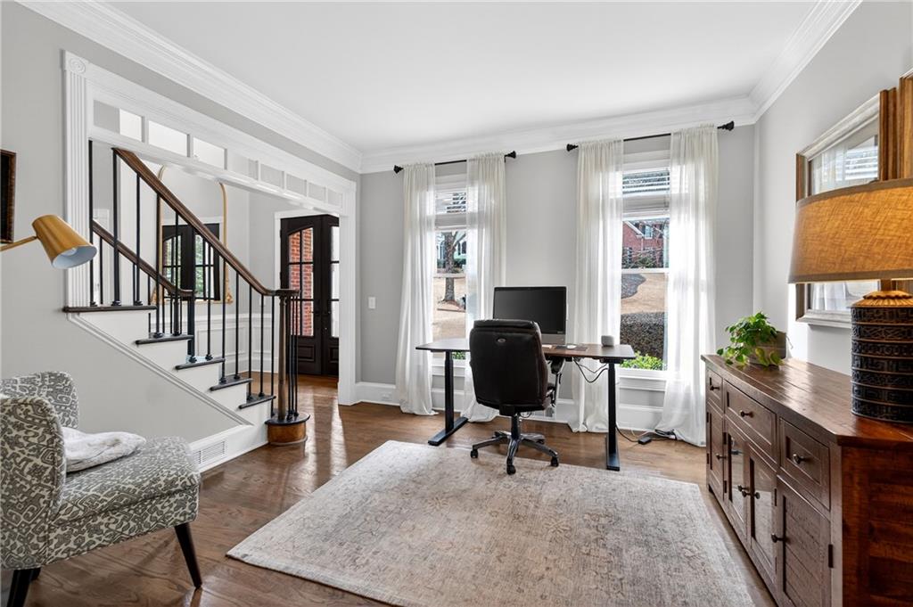 14325 Morning Mountain Way Milton, GA 30004 - Photo 20 of 66 a view of a livingroom with workspace and a window