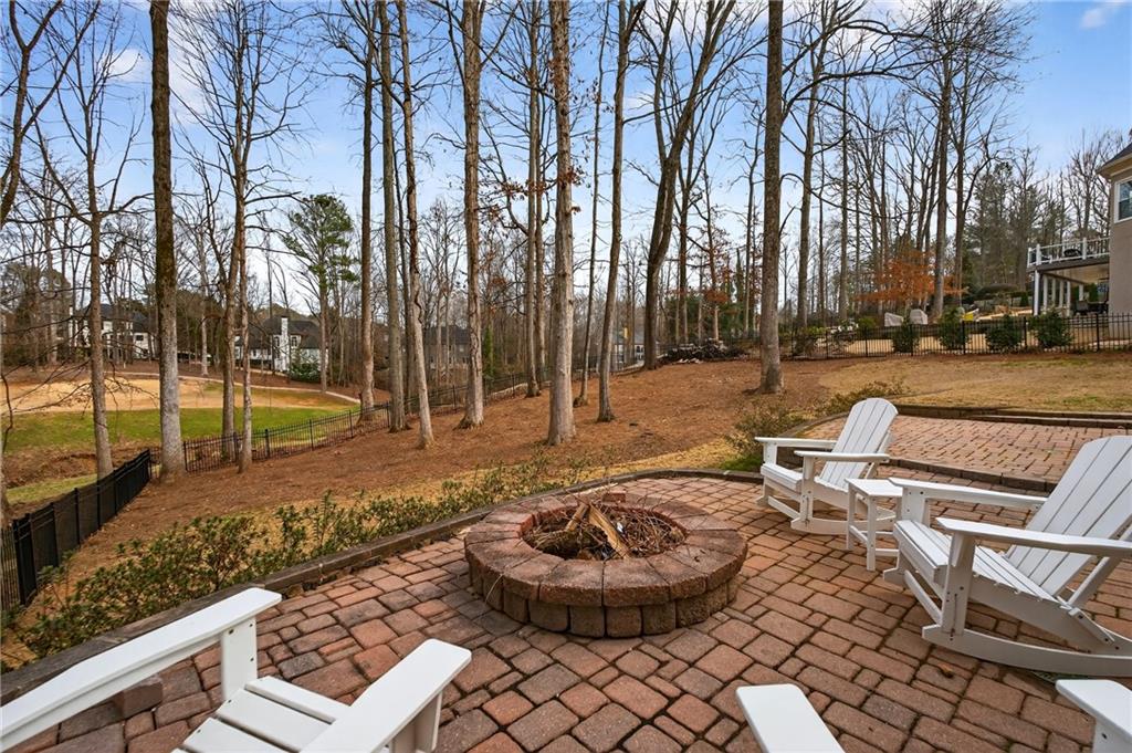 14325 Morning Mountain Way Milton, GA 30004 - Photo 49 of 66 a view of a patio with a yard