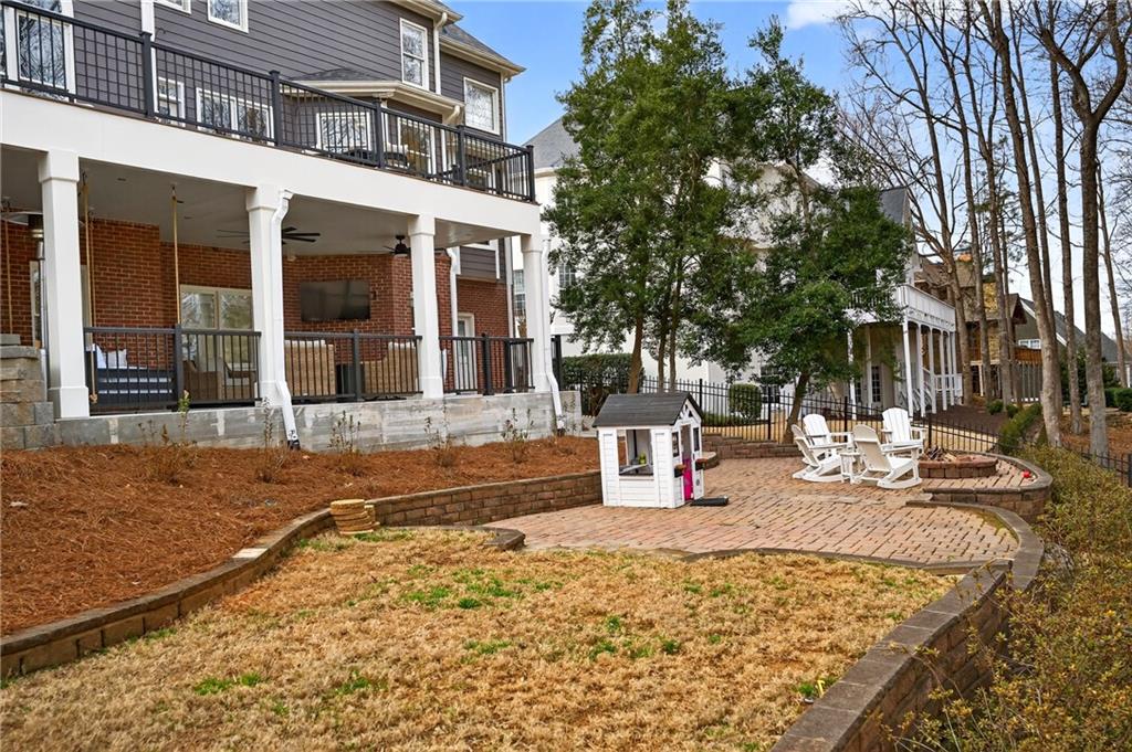 14325 Morning Mountain Way Milton, GA 30004 - Photo 52 of 66 front view of a house with a porch