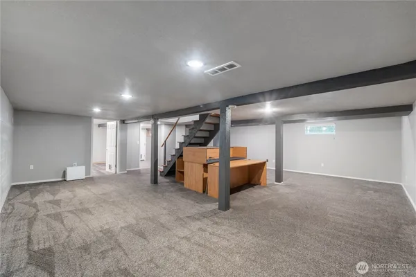 an empty room with gym equipment