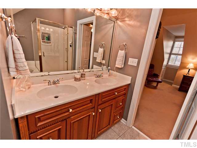 4405 Ennismore Circle Raleigh, NC 27613 - Photo 12 of 21 2nd master, with dual vanity, garden tub and separate shower.