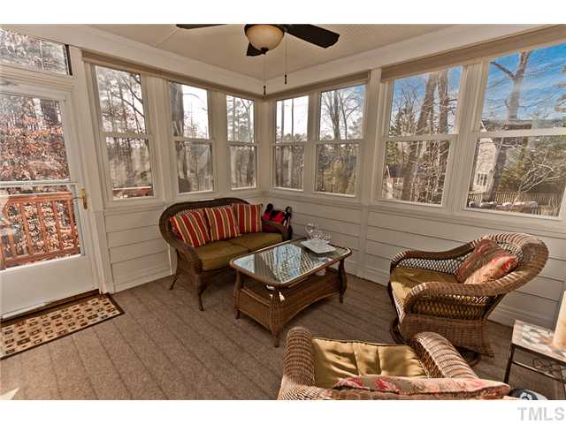 4405 Ennismore Circle Raleigh, NC 27613 - Photo 7 of 21 Sun room with ceiling fan and wonderful view of backyard.