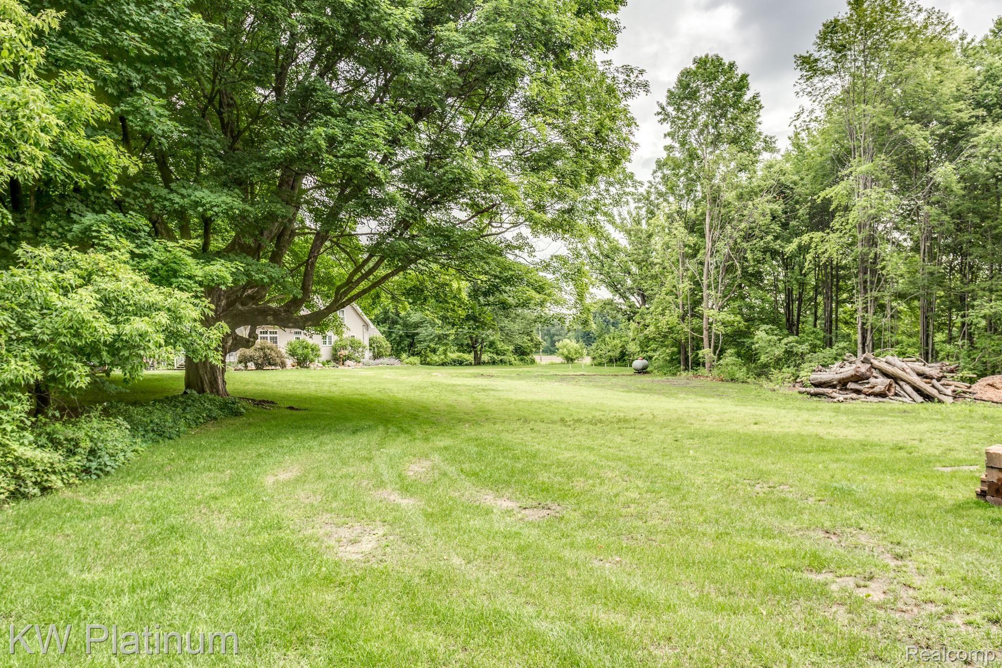 3347 Ruddock Road Avoca, MI 48006 - Photo 32 of 42 side yard.JPG