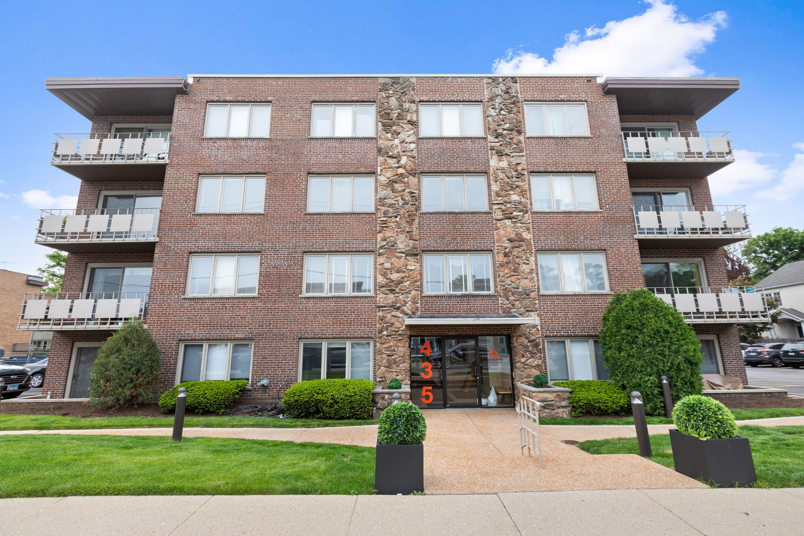 a front view of a multi story building