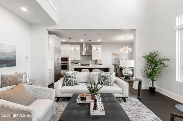a kitchen that has a table and chairs in it