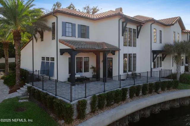 a view of a street with an ocean view